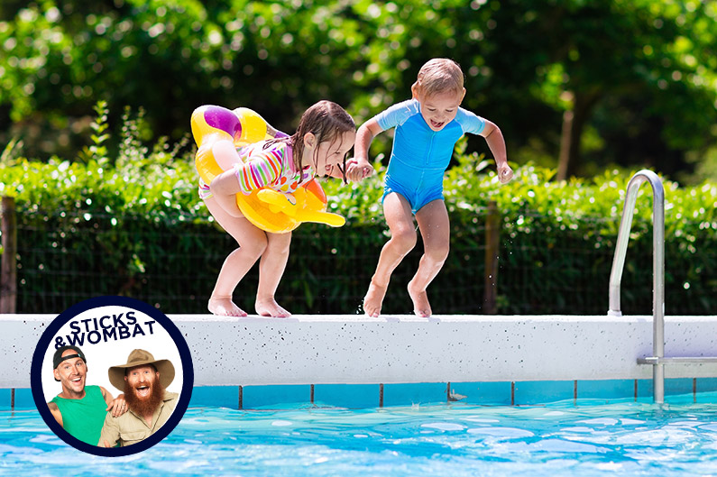 children jumping into pool